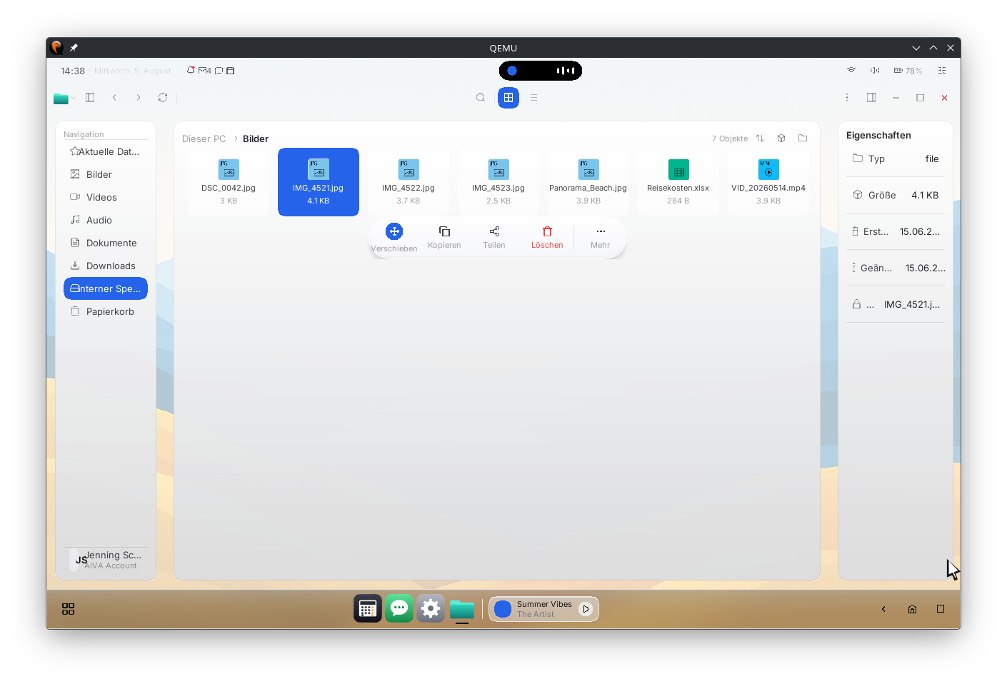 Grid view: file tiles with type-specific icons, a selected image, a floating action bar and a properties pane